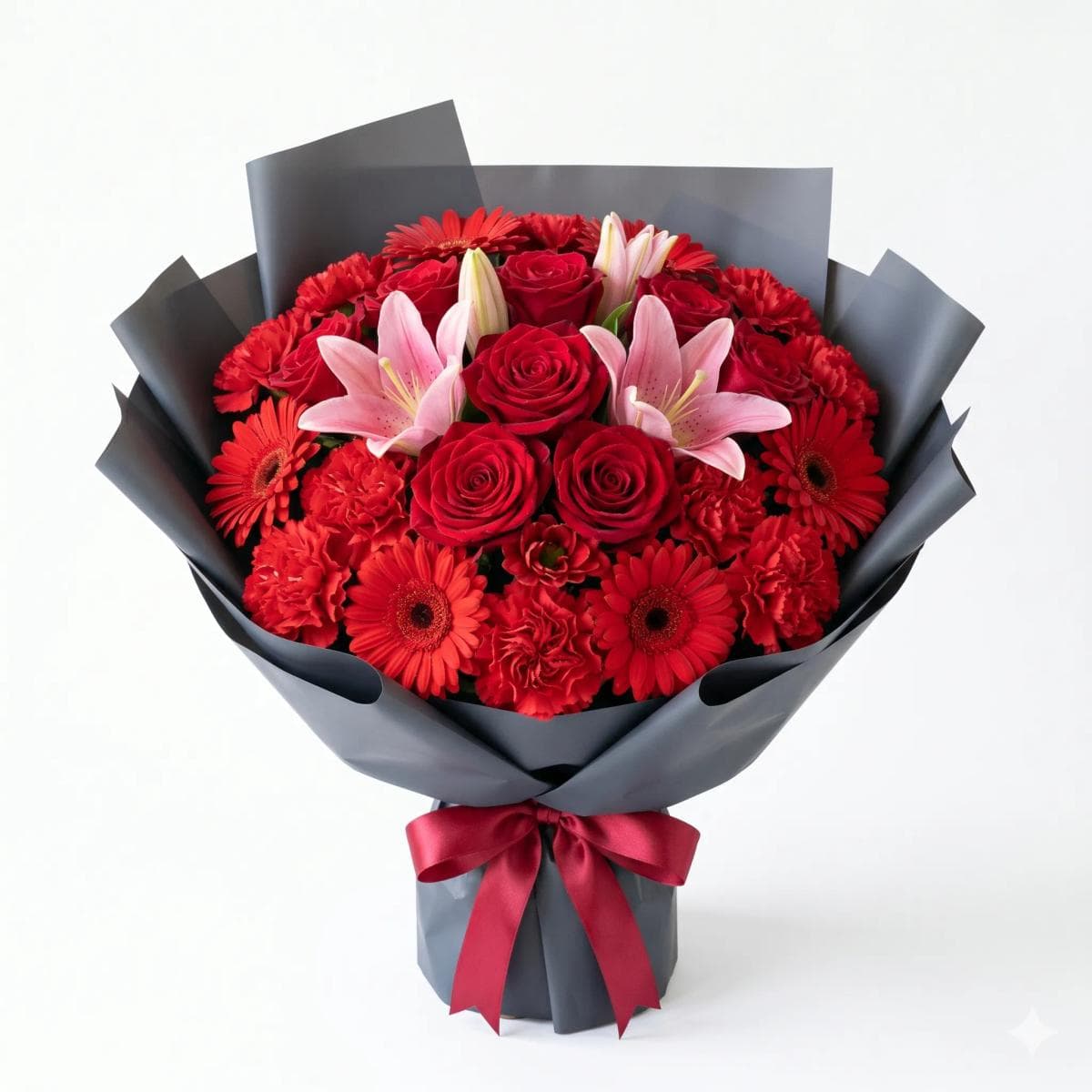 35cm flower bouquet with 5 red roses, 2 pink lilies, 5 red gerbera, and 5 red carnations in deep charcoal grey matte wrapping, designed for Valentine’s Day, dates, and romantic gifting in Chiang Mai.