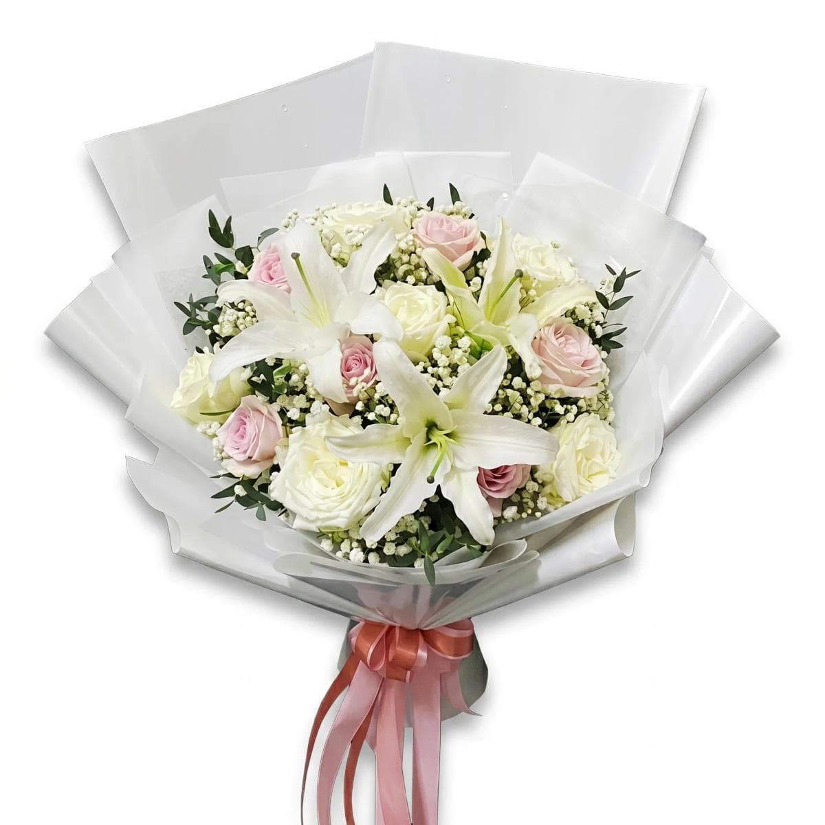 A soft mixed bouquet in white and pastel tones — thoughtfully arranged with seasonal blooms and light greenery for a clean, elegant look. Flower types may vary based on daily availability, while the overall style and color palette stay the same.