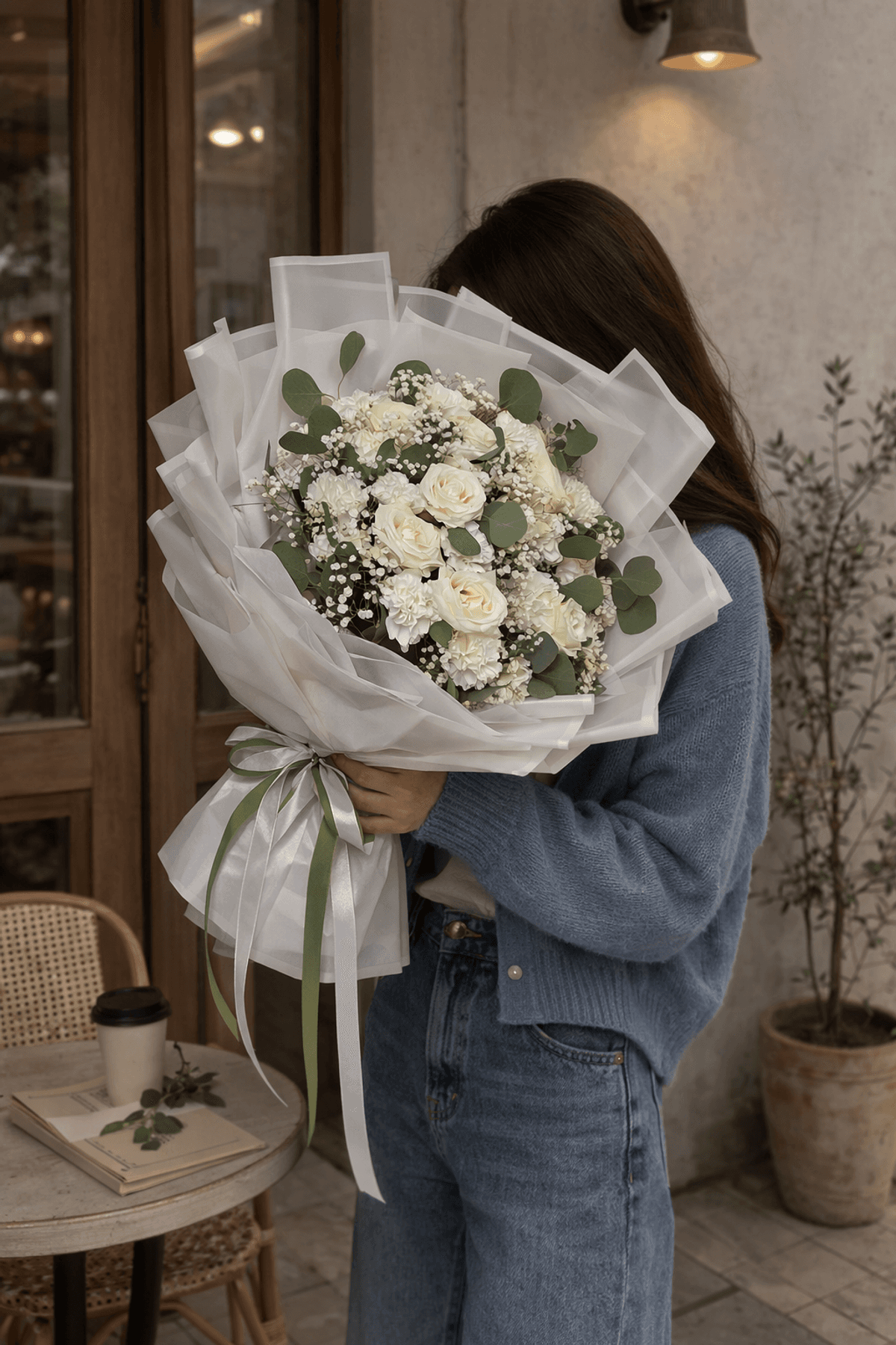 A clean, elegant mono bouquet featuring one main flower type, styled with light seasonal greenery for a refined look. Wrapped with premium paper and finished with a ribbon — perfect for any occasion.