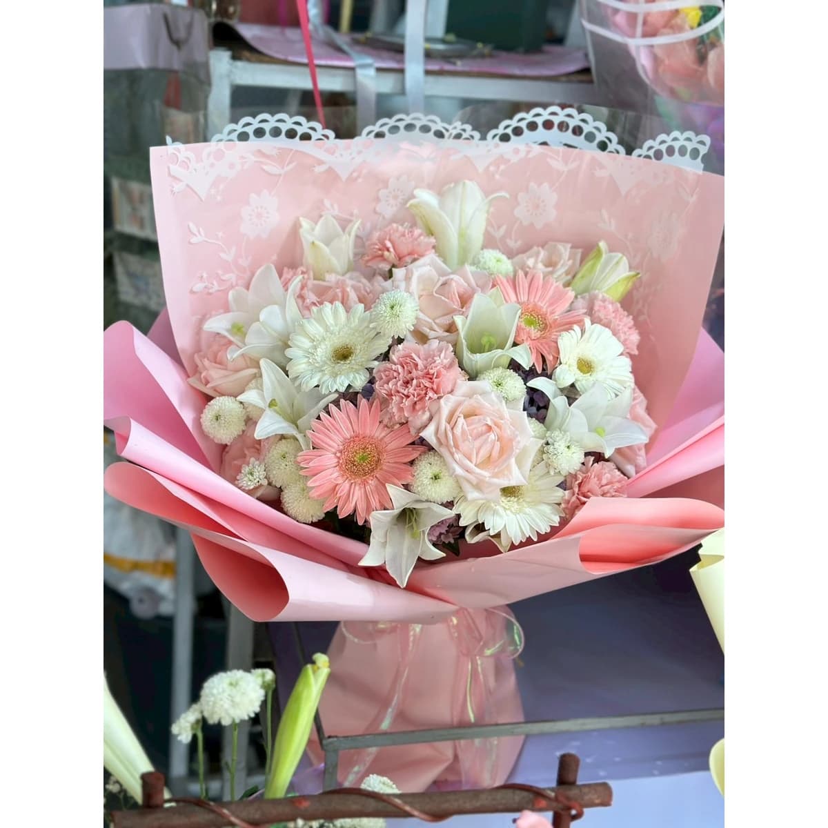 Pink Roses | Elegant Mixed Bouquet with Pink lilies, gerbera daisies, roses, carnations, chrysanthemums, wrapped in pink